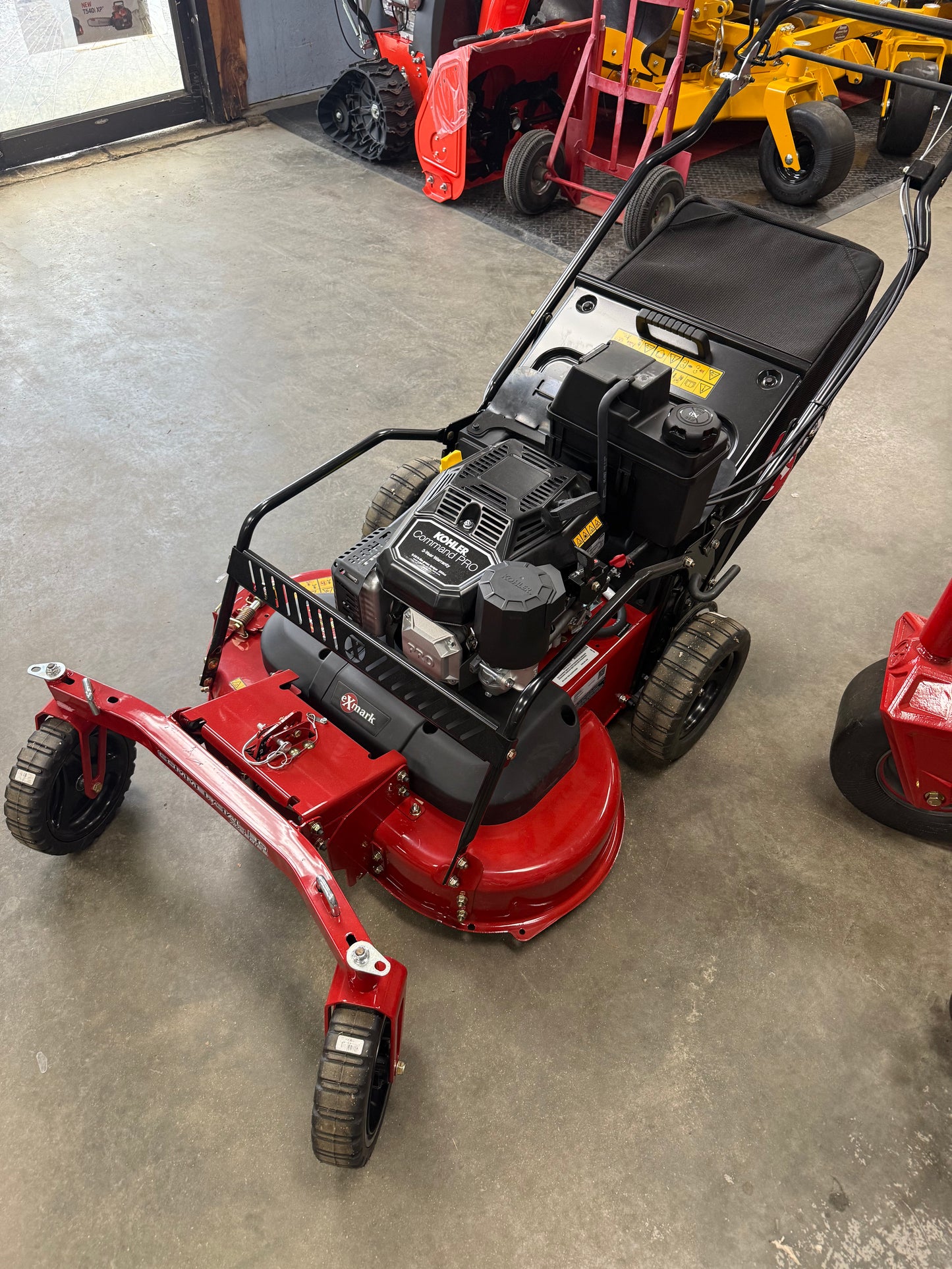 Exmark Commercial 30 X-Series Self Propelled 30" Mower with Kohler ECV200 Engine & Pivo ting Front Wheels  Dave’s Lawnmower Swansea MA